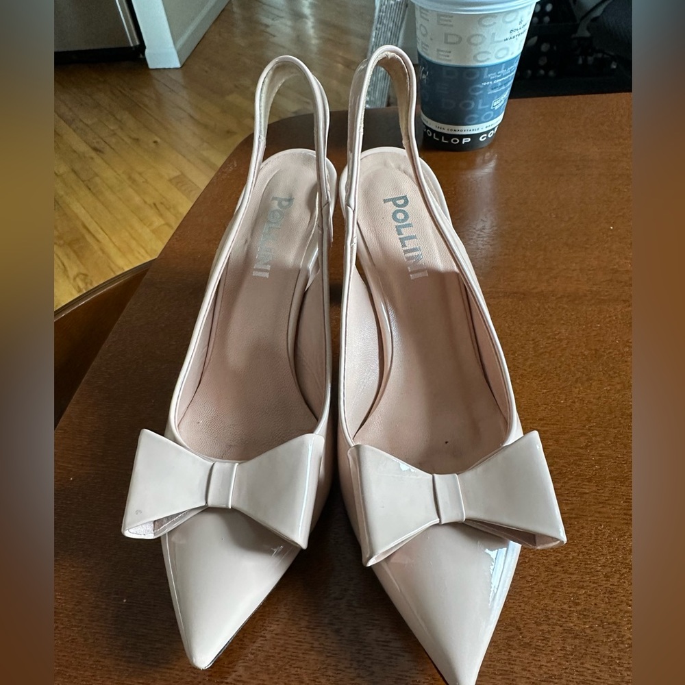 Blush pink Pollini sling backs with dust bag. Slight wear on the sole and strap.